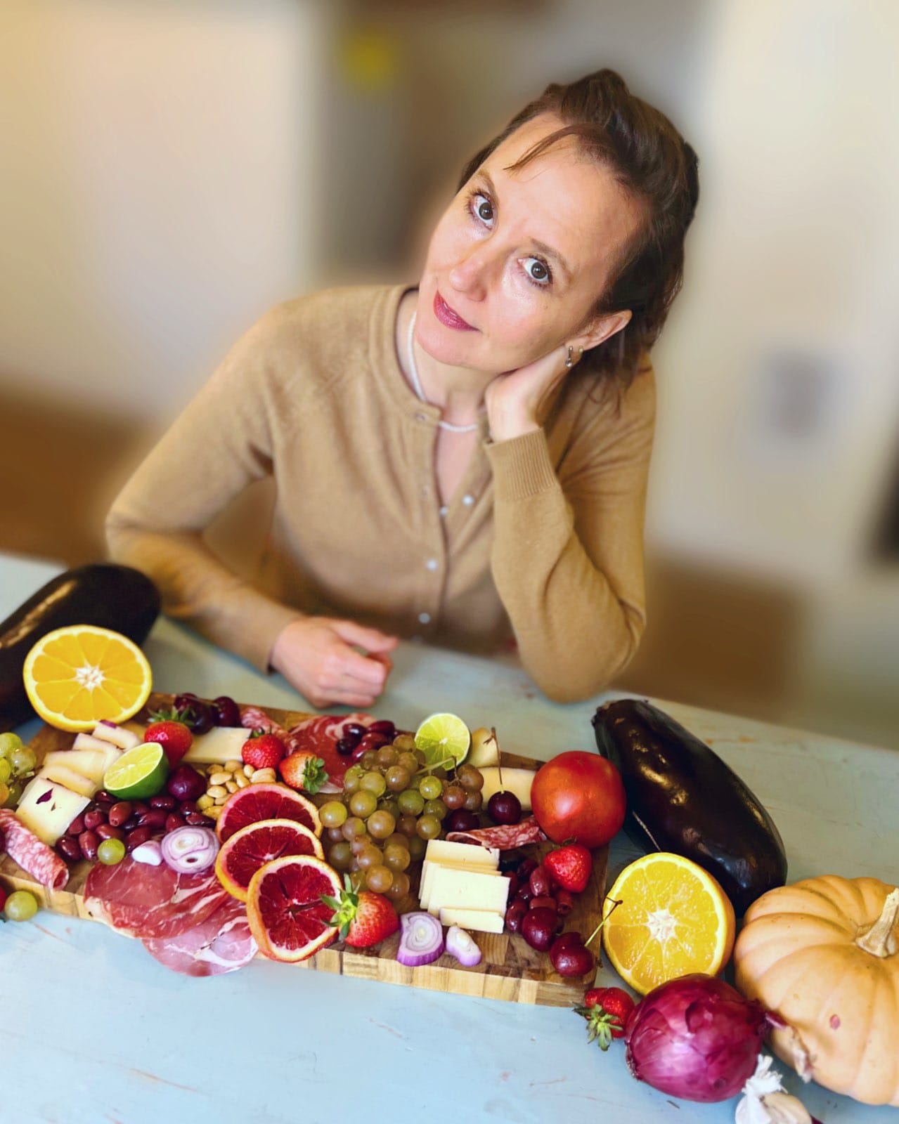 Alexia Valdes with a beautiful food spread