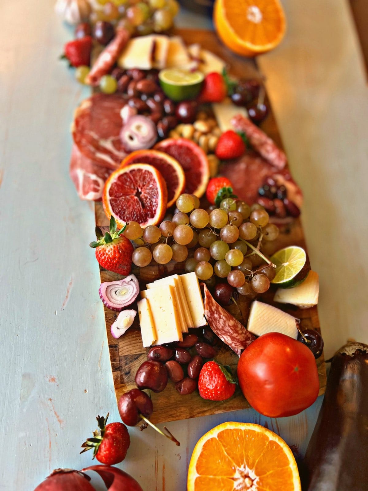 Colorful charcuterie and fruit board